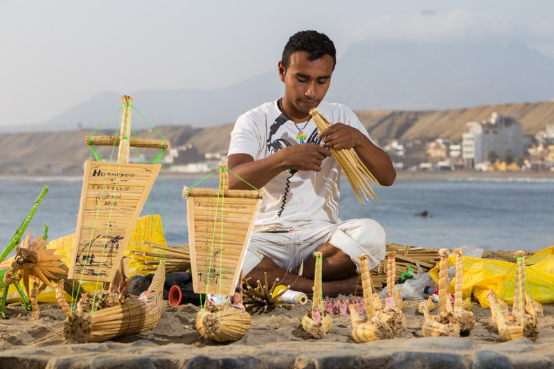 This guy was making reed souvenirs by hand at the pier. Photo courtesy of Brendan's Adventures