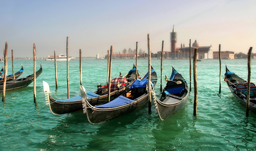 Gondolas on Grand Canal in front of San Giorgio Maggiore church - Venice, Italy