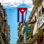 Flag hanging from buildings in Cuba